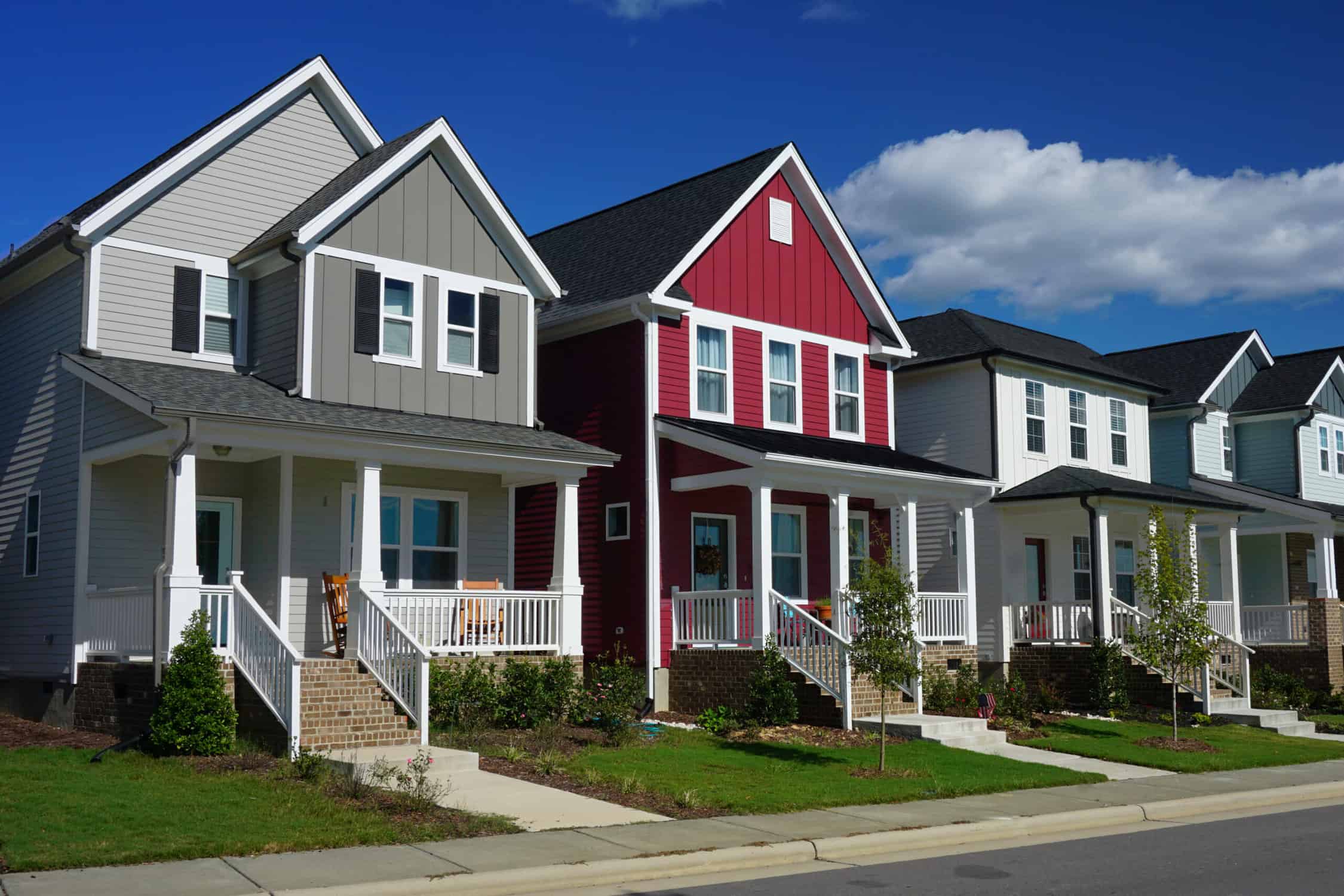 Red and Gray Row Houses in Suburbia- House Painting Services in Fort Collins, CO