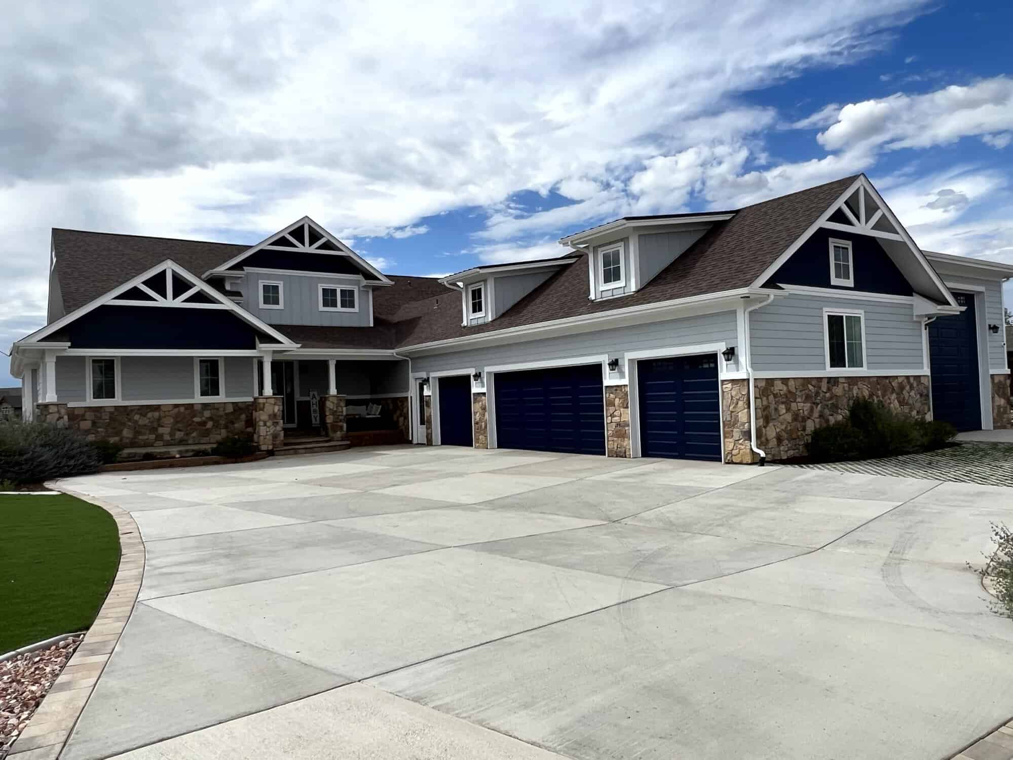 A House Exterior with Law and Driveway- Exterior House Painting Services in Erie, CO