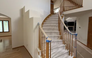Copy of IMG_1810 Elegant curved staircase in spacious foyer