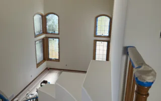 Copy of IMG_1823 Spacious staircase with large windows.