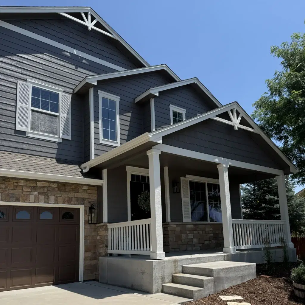 Colorado home with white PVC trim against gray siding