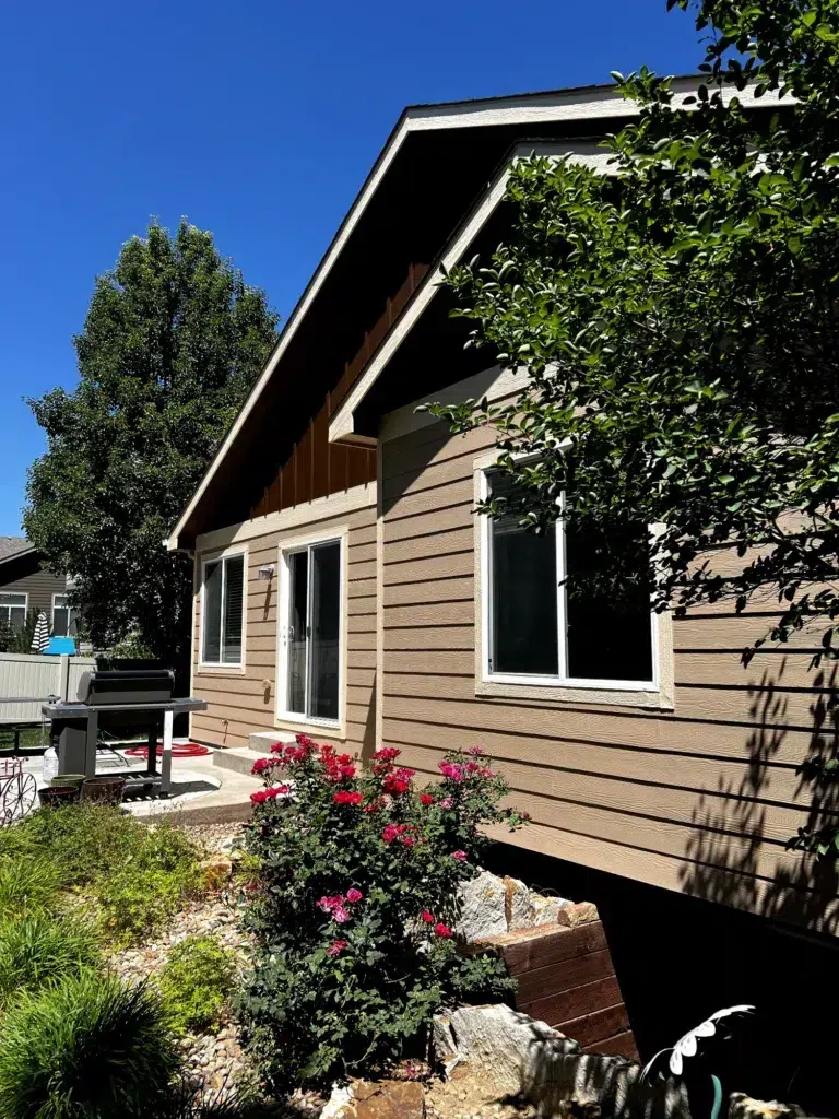 Tan Fiber Cement Siding Home Tan painted home exterior in Colorado
